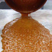English Toffee being poured from traditional Copper Pot by Sweet Traders