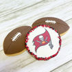 Super Bowl Decorated Sugar Cookies with brown football cookies and red and black Tampa bay buccaneer logo cookies